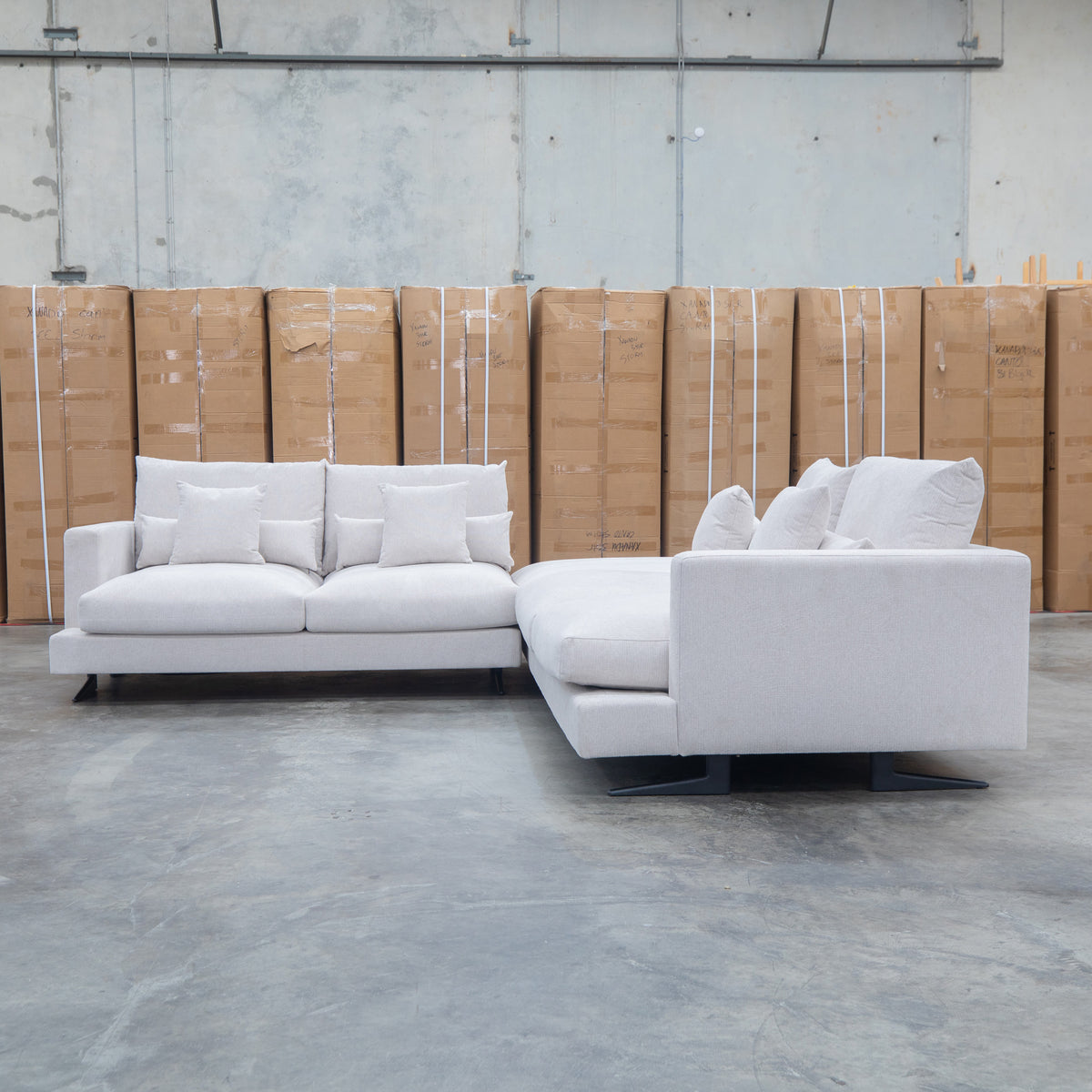 The Melbourne Deep Seat Feather & Foam Modular Corner Lounge - Biscuit available to purchase from Warehouse Furniture Clearance at our next sale event.