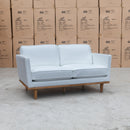 The Lana 2 Seater Leather Sofa - White available to purchase from Warehouse Furniture Clearance at our next sale event.