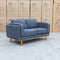 The Delilah Two Seat Sofa - Lance Charcoal available to purchase from Warehouse Furniture Clearance at our next sale event.