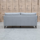 The Sabino Leather Three Seater Sofa - Light Grey available to purchase from Warehouse Furniture Clearance at our next sale event.