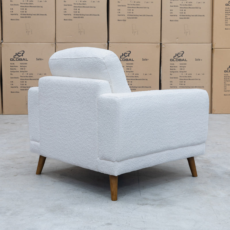 The Harlow Single Armchair - Ivory Boucle Fabric available to purchase from Warehouse Furniture Clearance at our next sale event.
