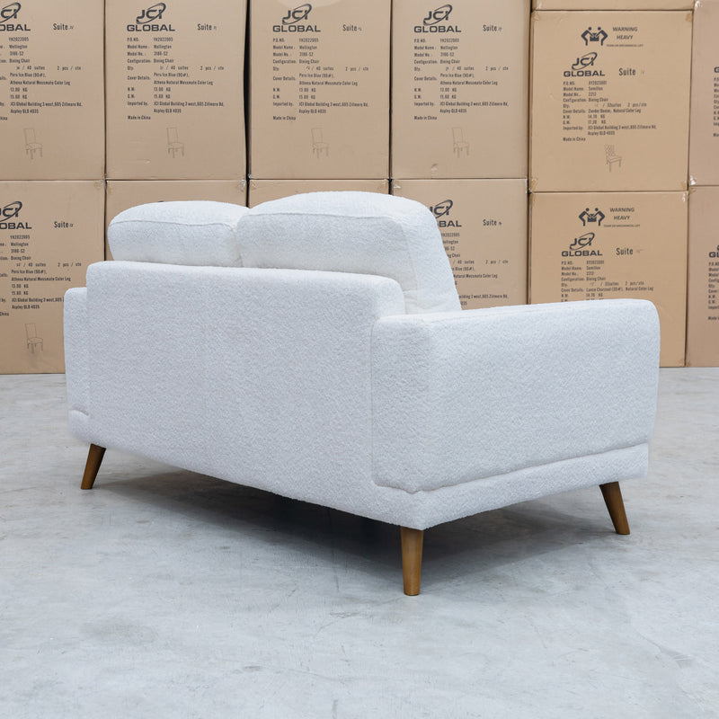 The Harlow Two Seater Sofa - Ivory Boucle Fabric available to purchase from Warehouse Furniture Clearance at our next sale event.