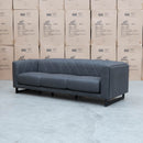 The Santosa Three Seat Fabric Sofa - Charcoal available to purchase from Warehouse Furniture Clearance at our next sale event.