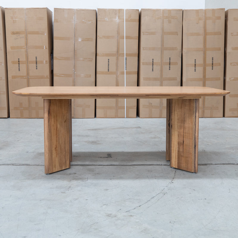 The Malbec 240cm Marri Timber Dining Table available to purchase from Warehouse Furniture Clearance at our next sale event.