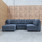 The Malta Modular Corner Lounge with Accent Ottoman - Charcoal available to purchase from Warehouse Furniture Clearance at our next sale event.
