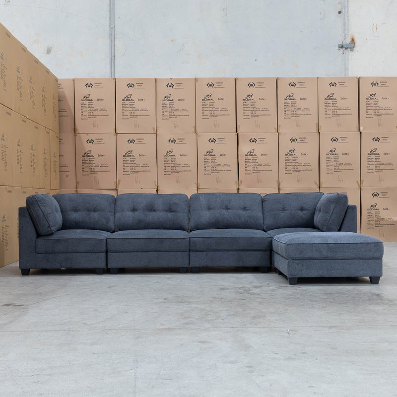 The Malta Modular Corner Lounge with Accent Ottoman - Charcoal available to purchase from Warehouse Furniture Clearance at our next sale event.