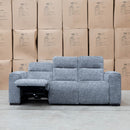 The Marina Bay Feather & Foam Dual Motor Electric Three Seater Lounge - Signature Grey available to purchase from Warehouse Furniture Clearance at our next sale event.