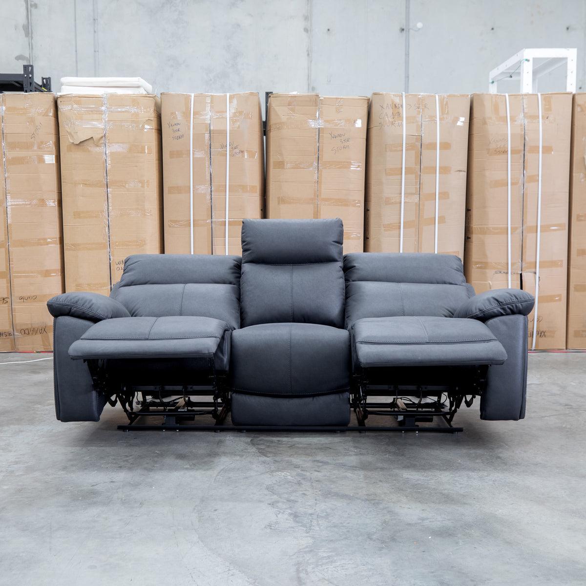 The Marsellie Three Seater Triple Motor Electric Recliner Lounge - Coal available to purchase from Warehouse Furniture Clearance at our next sale event.