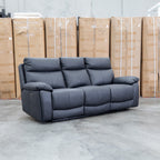 The Marsellie Three Seater Triple Motor Electric Recliner Lounge - Coal available to purchase from Warehouse Furniture Clearance at our next sale event.
