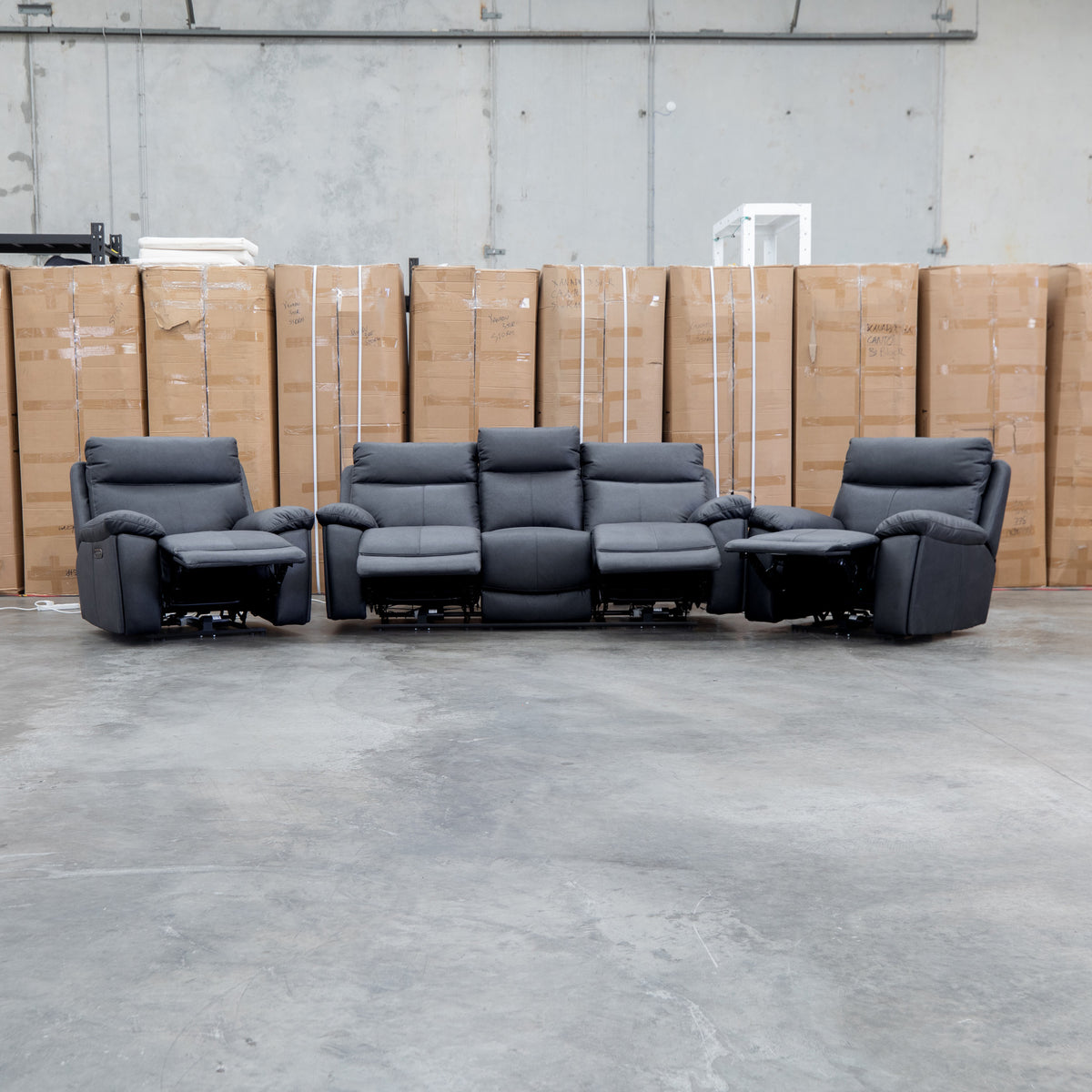 The Marsellie Three Seater Triple Motor Electric Recliner Lounge - Coal available to purchase from Warehouse Furniture Clearance at our next sale event.