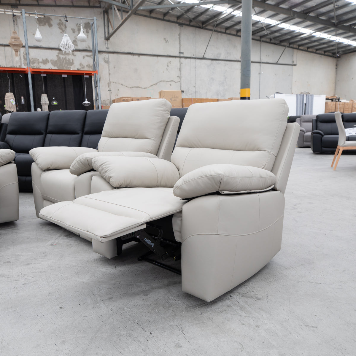 The Bayview Single Manual Leather Recliner - Grey available to purchase from Warehouse Furniture Clearance at our next sale event.