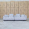 The Maven Curved Fabric Four Seat Sofa - Pewter available to purchase from Warehouse Furniture Clearance at our next sale event.