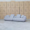 The Maven Curved Fabric Four Seat Sofa - Pewter available to purchase from Warehouse Furniture Clearance at our next sale event.