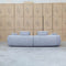 The Maven Curved Fabric Four Seat Sofa - Pewter available to purchase from Warehouse Furniture Clearance at our next sale event.