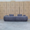The Maven Curved Fabric Four Seat Sofa - Charcoal available to purchase from Warehouse Furniture Clearance at our next sale event.