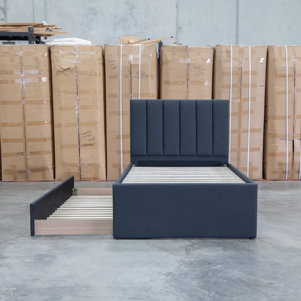 The Medford King Single Fabric Trundle Bed - Charcoal (Reversible Trundle) available to purchase from Warehouse Furniture Clearance at our next sale event.