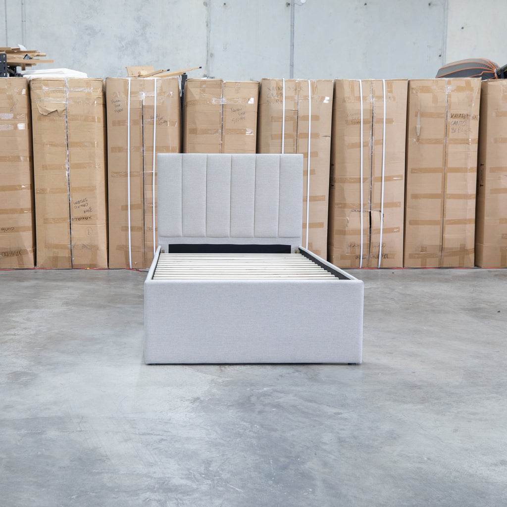 The Medford King Single Fabric Trundle Bed - Oat White (Reversible Trundle) available to purchase from Warehouse Furniture Clearance at our next sale event.