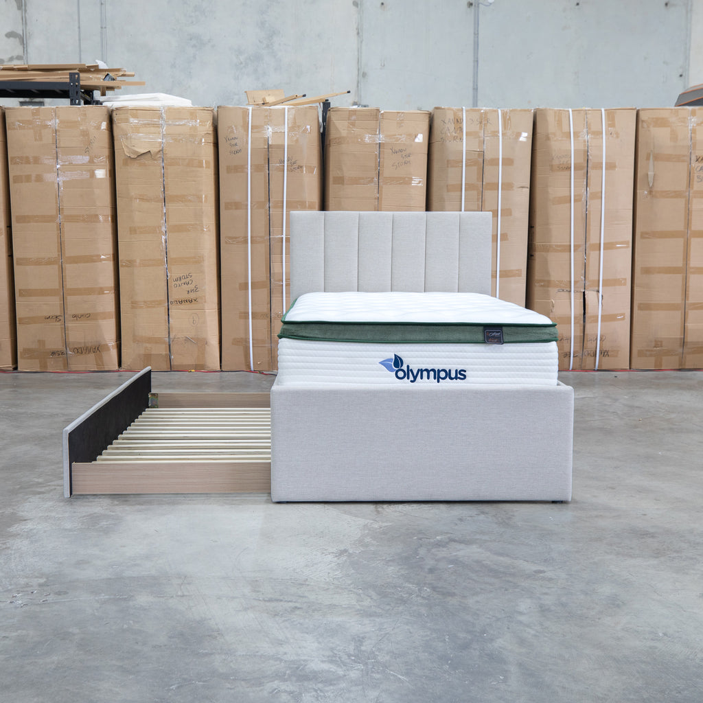 The Medford King Single Fabric Trundle Bed - Oat White (Reversible Trundle) available to purchase from Warehouse Furniture Clearance at our next sale event.