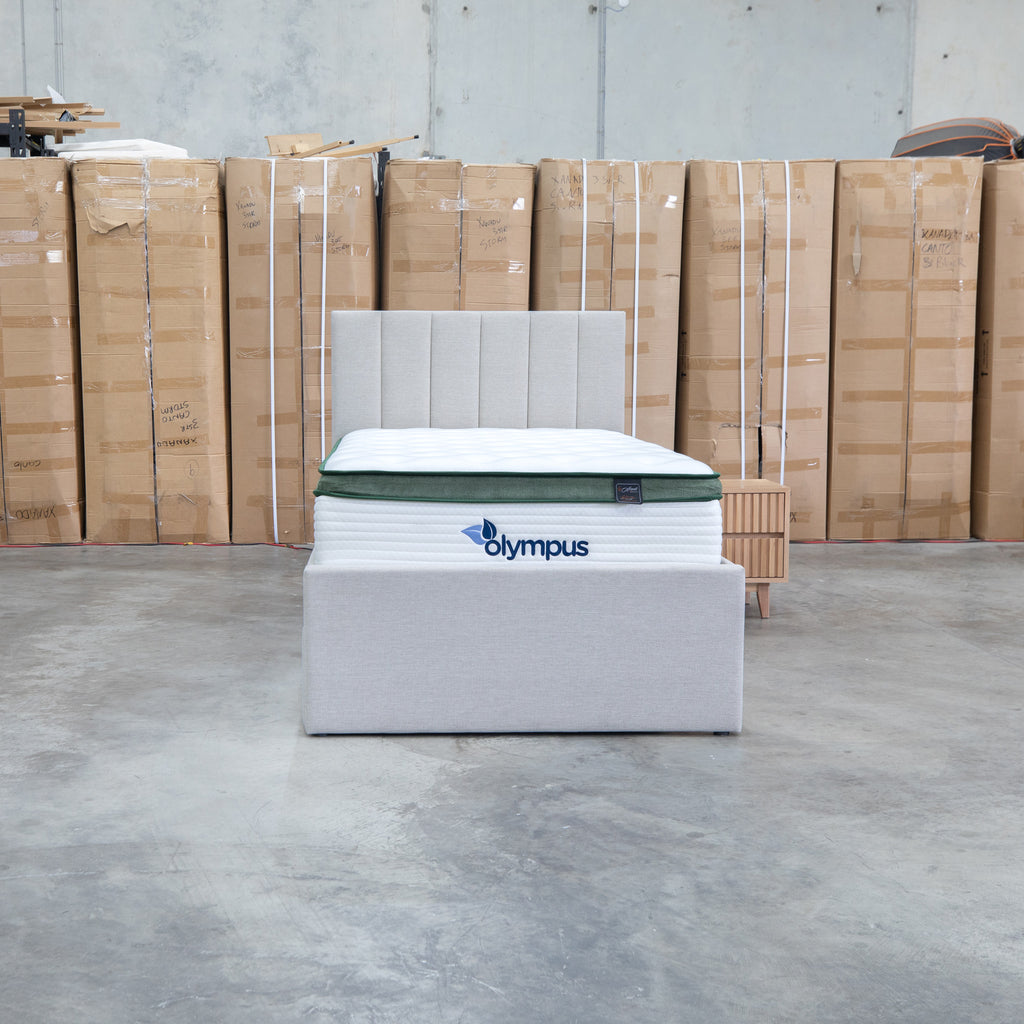 The Medford King Single Fabric Trundle Bed - Oat White (Reversible Trundle) available to purchase from Warehouse Furniture Clearance at our next sale event.