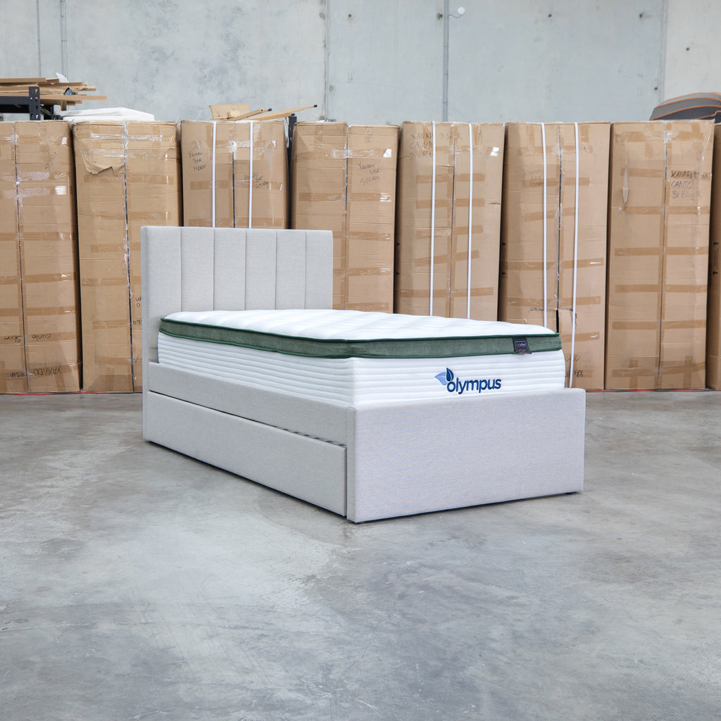 The Medford King Single Fabric Trundle Bed - Oat White (Reversible Trundle) available to purchase from Warehouse Furniture Clearance at our next sale event.