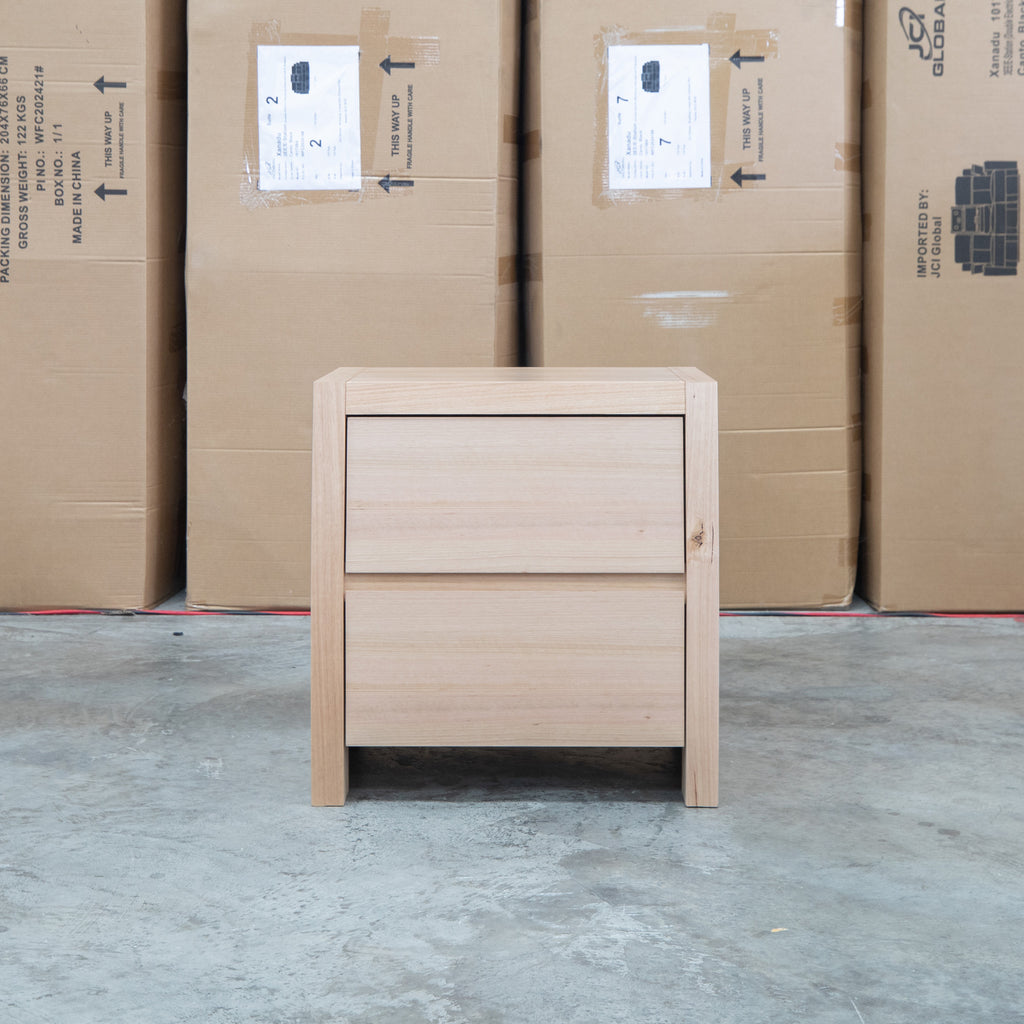 The Melba Curved Messmate Two Drawer Bedside available to purchase from Warehouse Furniture Clearance at our next sale event.