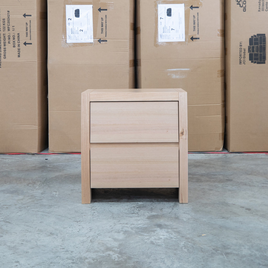 The Melba Curved Messmate Two Drawer Bedside available to purchase from Warehouse Furniture Clearance at our next sale event.