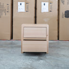 The Melba Curved Messmate Two Drawer Bedside available to purchase from Warehouse Furniture Clearance at our next sale event.