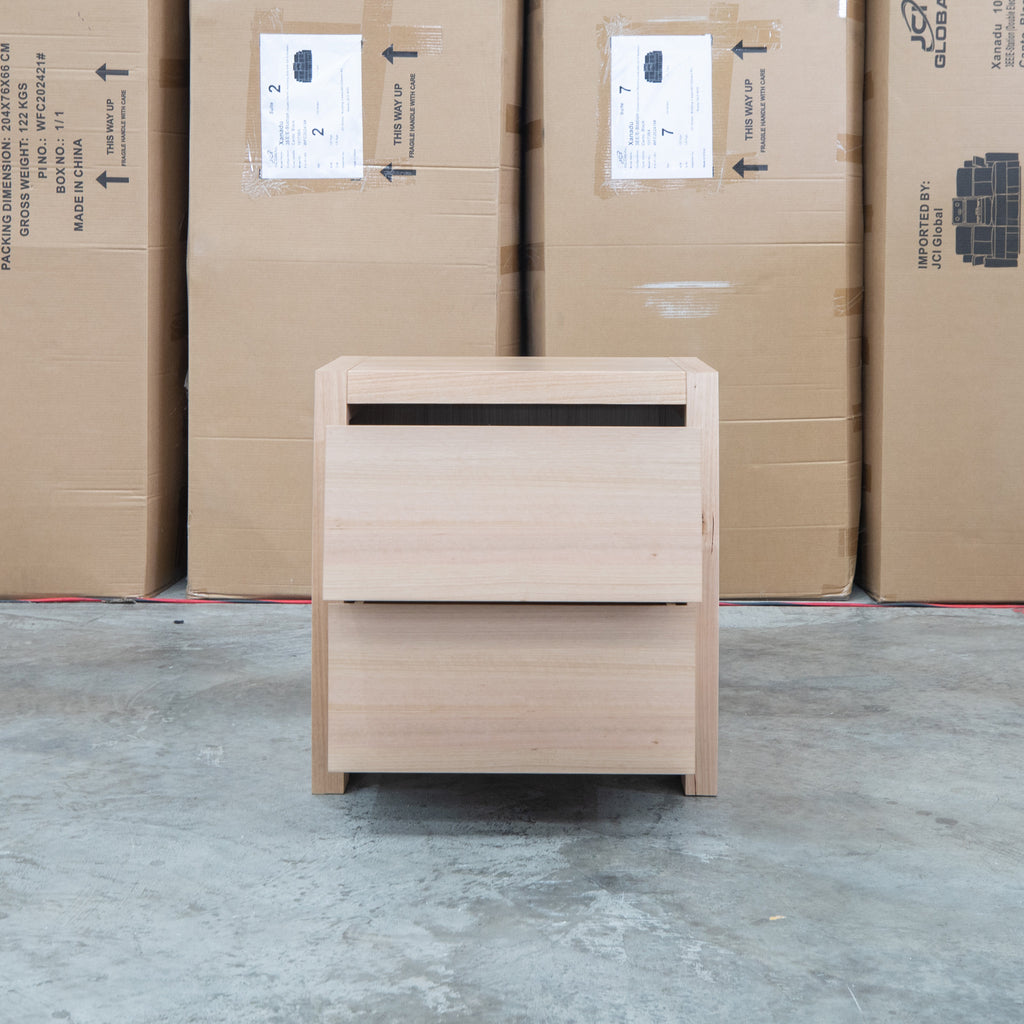 The Melba Curved Messmate Two Drawer Bedside available to purchase from Warehouse Furniture Clearance at our next sale event.