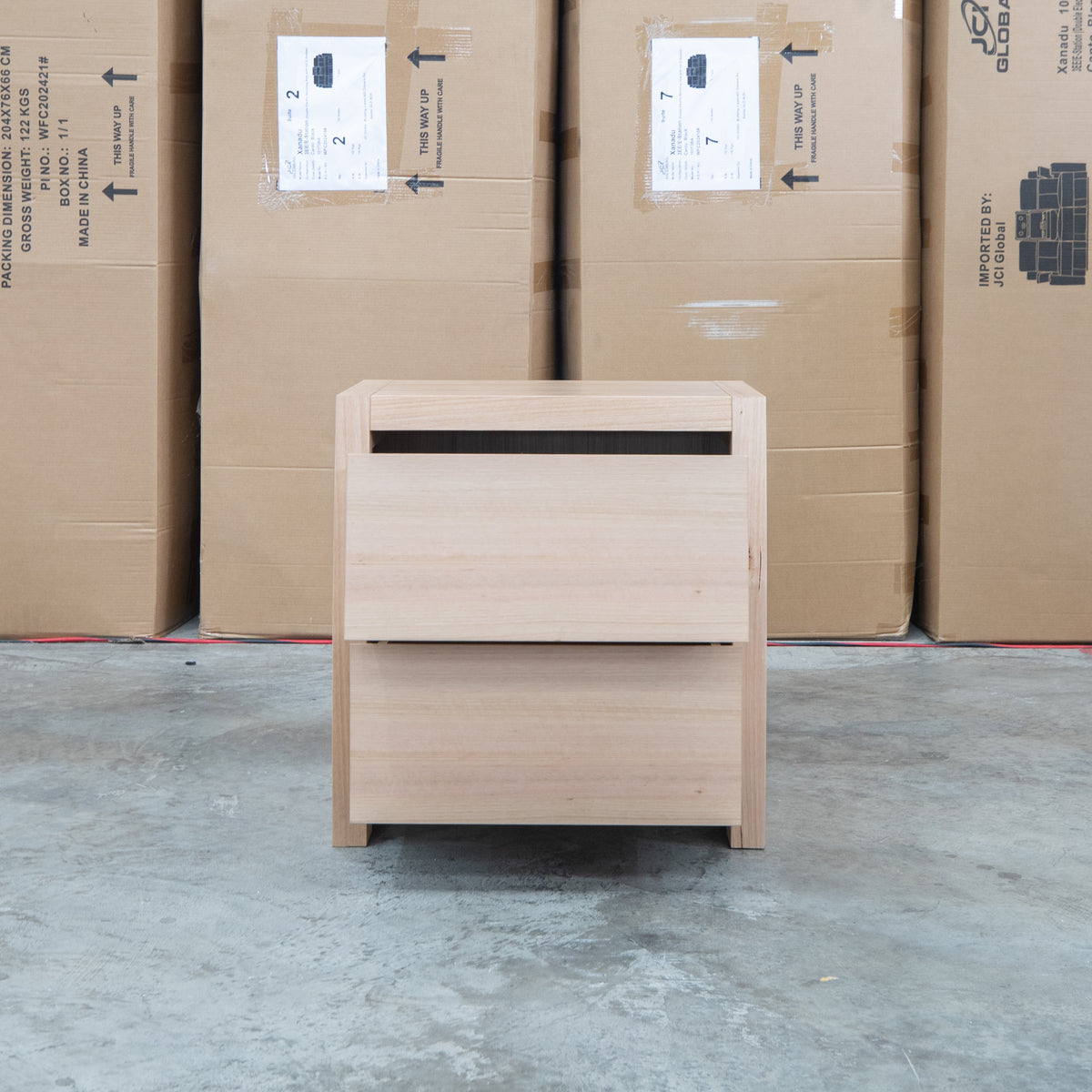 The Melba Curved Messmate Two Drawer Bedside available to purchase from Warehouse Furniture Clearance at our next sale event.