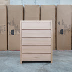 The Melba Curved Australian Messmate Five Drawer Tallboy available to purchase from Warehouse Furniture Clearance at our next sale event.