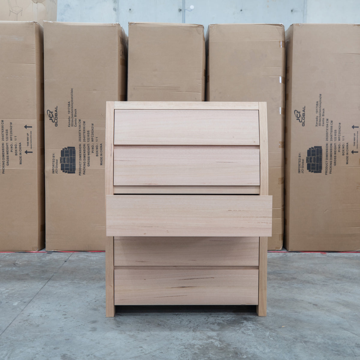 The Melba Curved Australian Messmate Five Drawer Tallboy available to purchase from Warehouse Furniture Clearance at our next sale event.