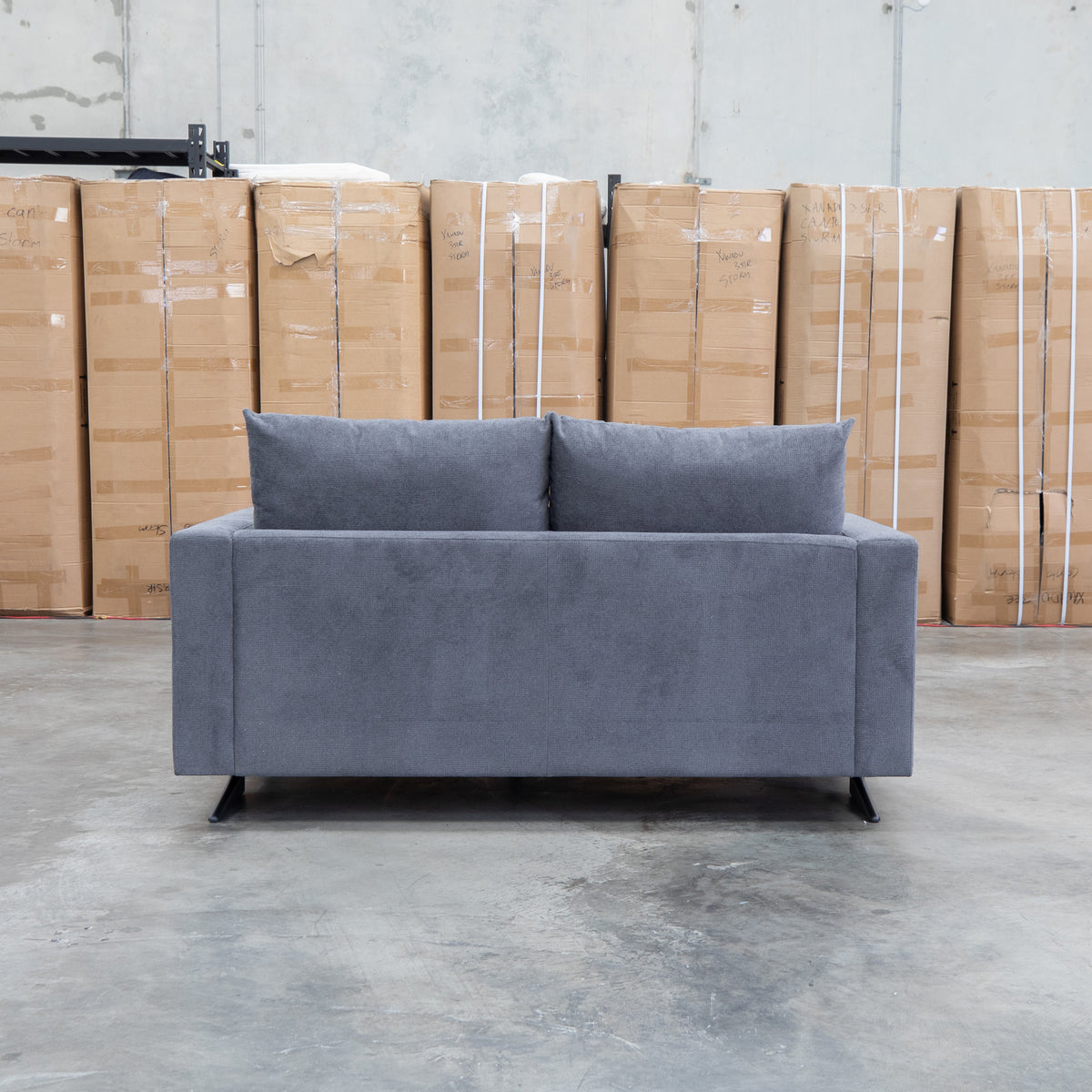 The Melbourne Deep Seat Feather & Foam Two Seat Sofa - Obsidian available to purchase from Warehouse Furniture Clearance at our next sale event.