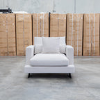 The Melbourne Deep Seat Feather & Foam Armchair - Biscuit available to purchase from Warehouse Furniture Clearance at our next sale event.