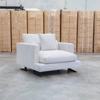 The Melbourne Deep Seat Feather & Foam Armchair - Biscuit available to purchase from Warehouse Furniture Clearance at our next sale event.