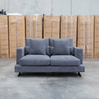 The Melbourne Deep Seat Feather & Foam Two Seat Sofa - Obsidian available to purchase from Warehouse Furniture Clearance at our next sale event.