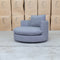 The Mesa Feather & Foam Round Swivel Daybed - Grey available to purchase from Warehouse Furniture Clearance at our next sale event.