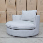 The Mesa Feather & Foam Round Swivel Daybed - Cream available to purchase from Warehouse Furniture Clearance at our next sale event.