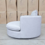 The Mesa Feather & Foam Round Swivel Daybed - Cream available to purchase from Warehouse Furniture Clearance at our next sale event.