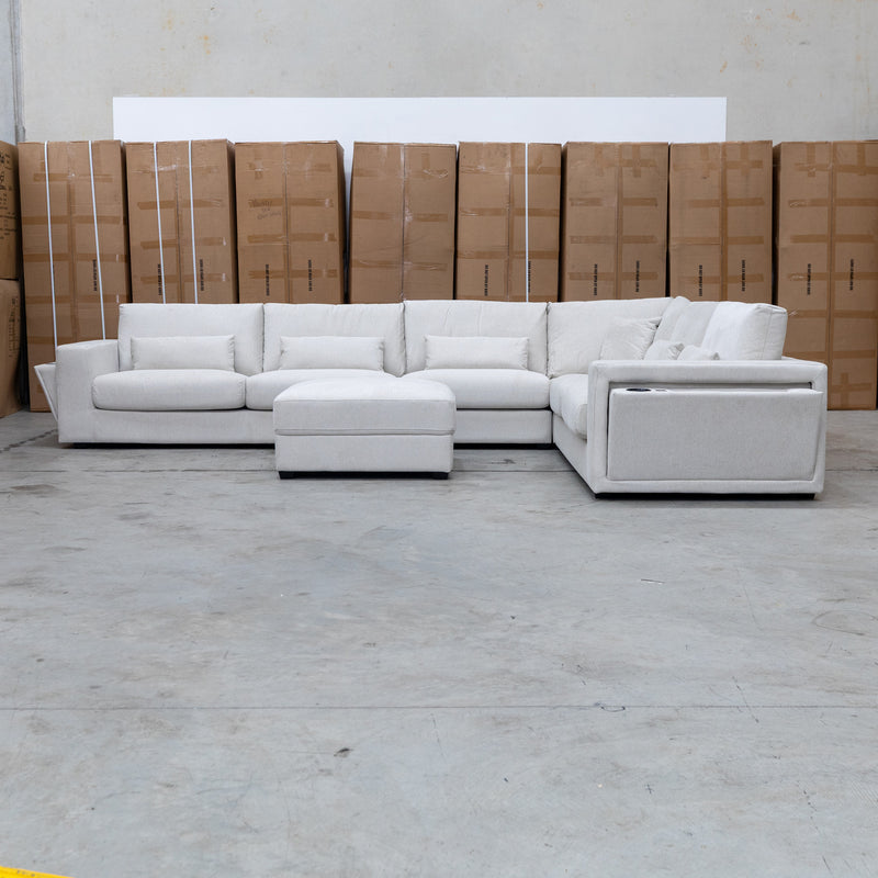 The Midtown Deep Seat Corner Lounge with Ottoman - Oat available to purchase from Warehouse Furniture Clearance at our next sale event.