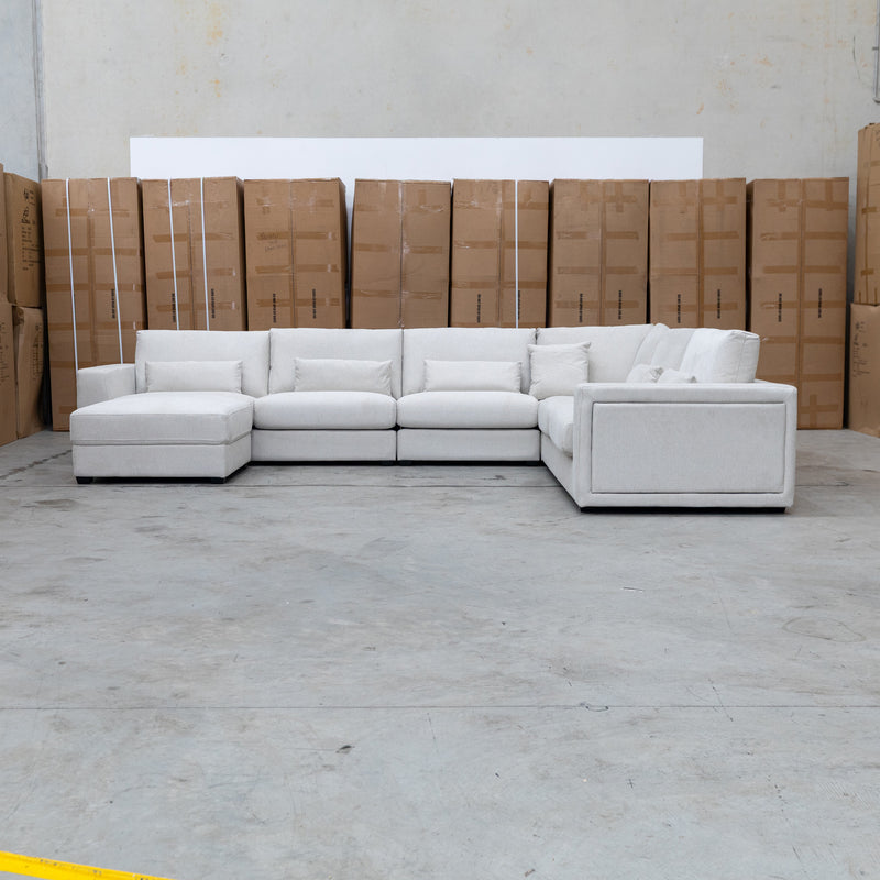 The Midtown Deep Seat Corner Lounge with Ottoman - Oat available to purchase from Warehouse Furniture Clearance at our next sale event.