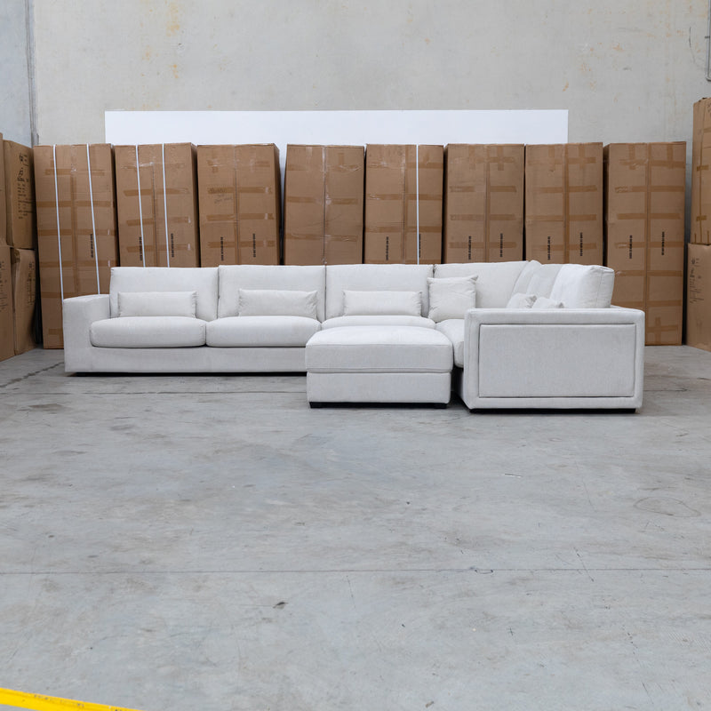 The Midtown Deep Seat Corner Lounge with Ottoman - Oat available to purchase from Warehouse Furniture Clearance at our next sale event.
