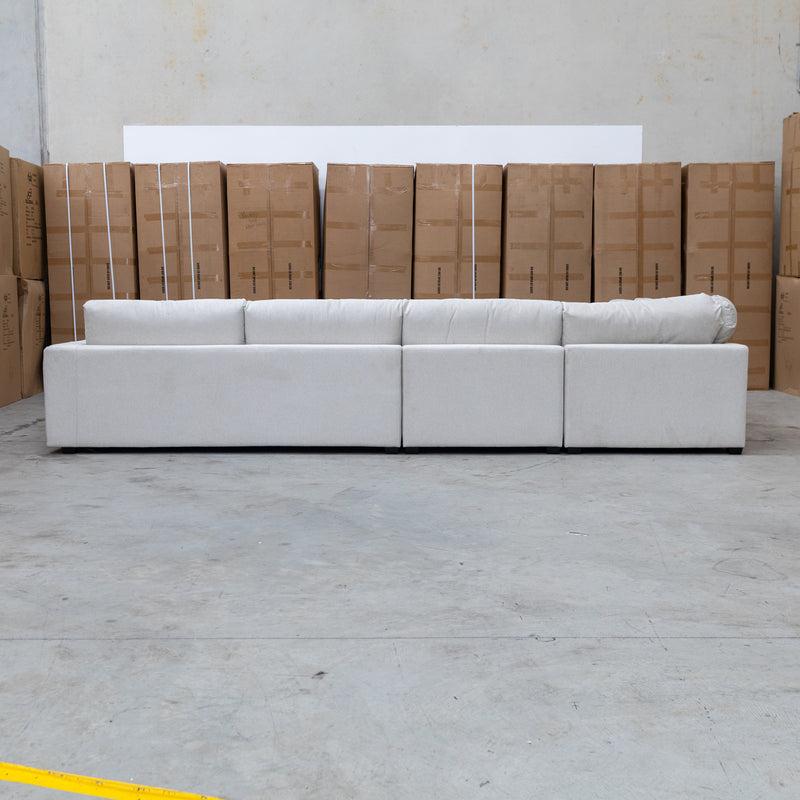 The Midtown Deep Seat Corner Lounge with Ottoman - Oat available to purchase from Warehouse Furniture Clearance at our next sale event.