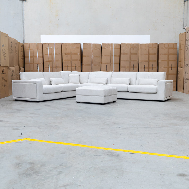 The Midtown Deep Seat Corner Lounge with Ottoman - Oat available to purchase from Warehouse Furniture Clearance at our next sale event.