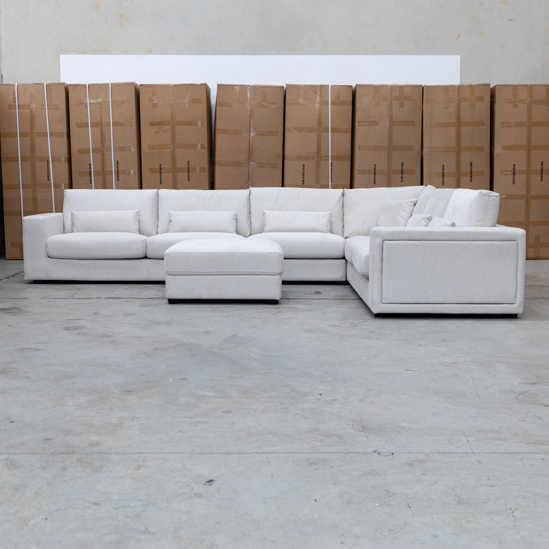 The Midtown Deep Seat Corner Lounge with Ottoman - Oat available to purchase from Warehouse Furniture Clearance at our next sale event.