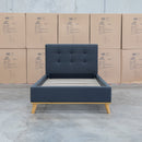 The Milos King Single Fabric Bed - Charcoal available to purchase from Warehouse Furniture Clearance at our next sale event.