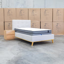 The Milos King Single Fabric Bed - Oat White available to purchase from Warehouse Furniture Clearance at our next sale event.