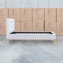 The Milos King Single Fabric Bed - Oat White available to purchase from Warehouse Furniture Clearance at our next sale event.