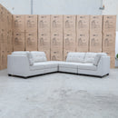 The Malta Modular Corner Lounge with Ottoman - Oat available to purchase from Warehouse Furniture Clearance at our next sale event.
