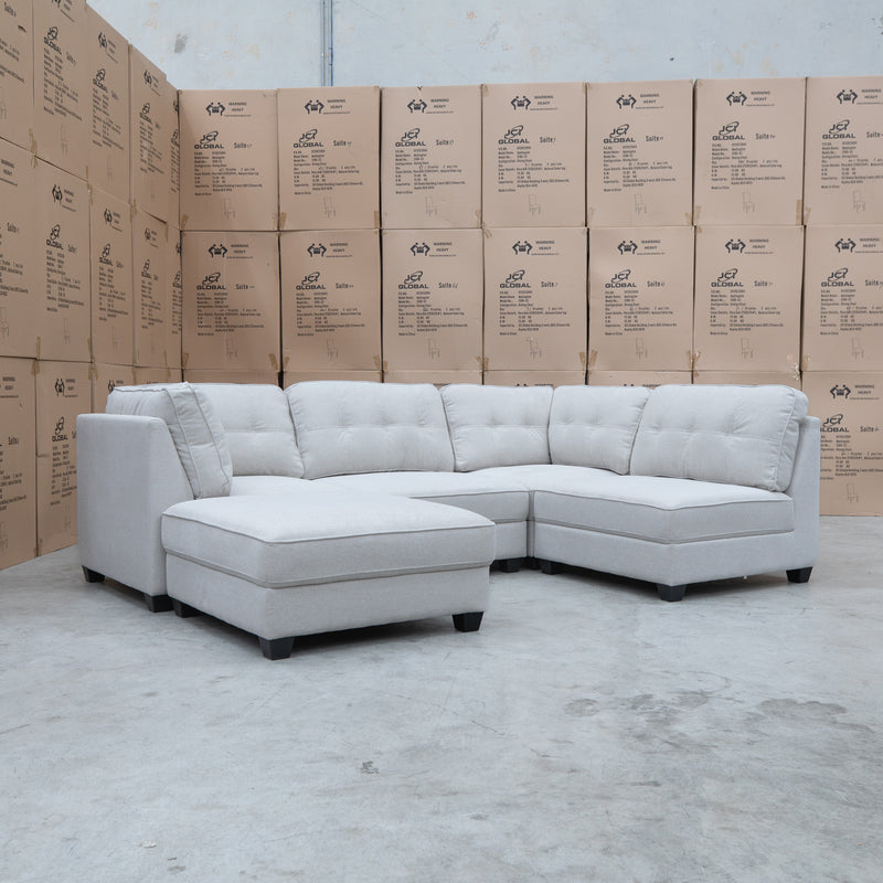 The Malta Modular Corner Lounge with Ottoman - Oat available to purchase from Warehouse Furniture Clearance at our next sale event.