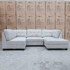 The Malta Modular Corner Lounge with Ottoman - Oat available to purchase from Warehouse Furniture Clearance at our next sale event.